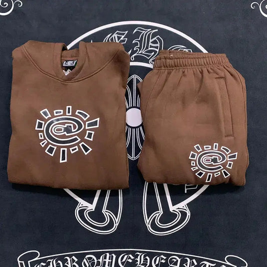 Jogging Vintage en velours épais avec imprimé Sun Roll, coupe ample et confortable, parfait pour streetwear et looks casual mixte.