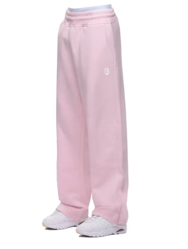 Jogging Streetwear Oversize Y2K Harajuku pour homme/femme, pantalon ample en coton et polyester avec poches cargo et détails brodés, style urbain moderne et décontracté.