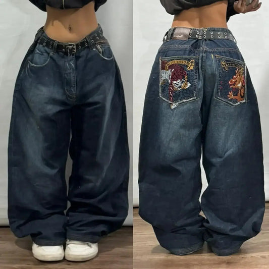 Jean large brodé bleu style Y2K avec motifs gothiques et coupe oversize taille haute
