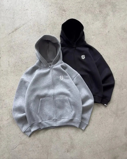 Streetwear Hoodie zippé pour homme et femme, sweat urbain en coton et polyester, coupe ample et confortable, style moderne et rétro.
