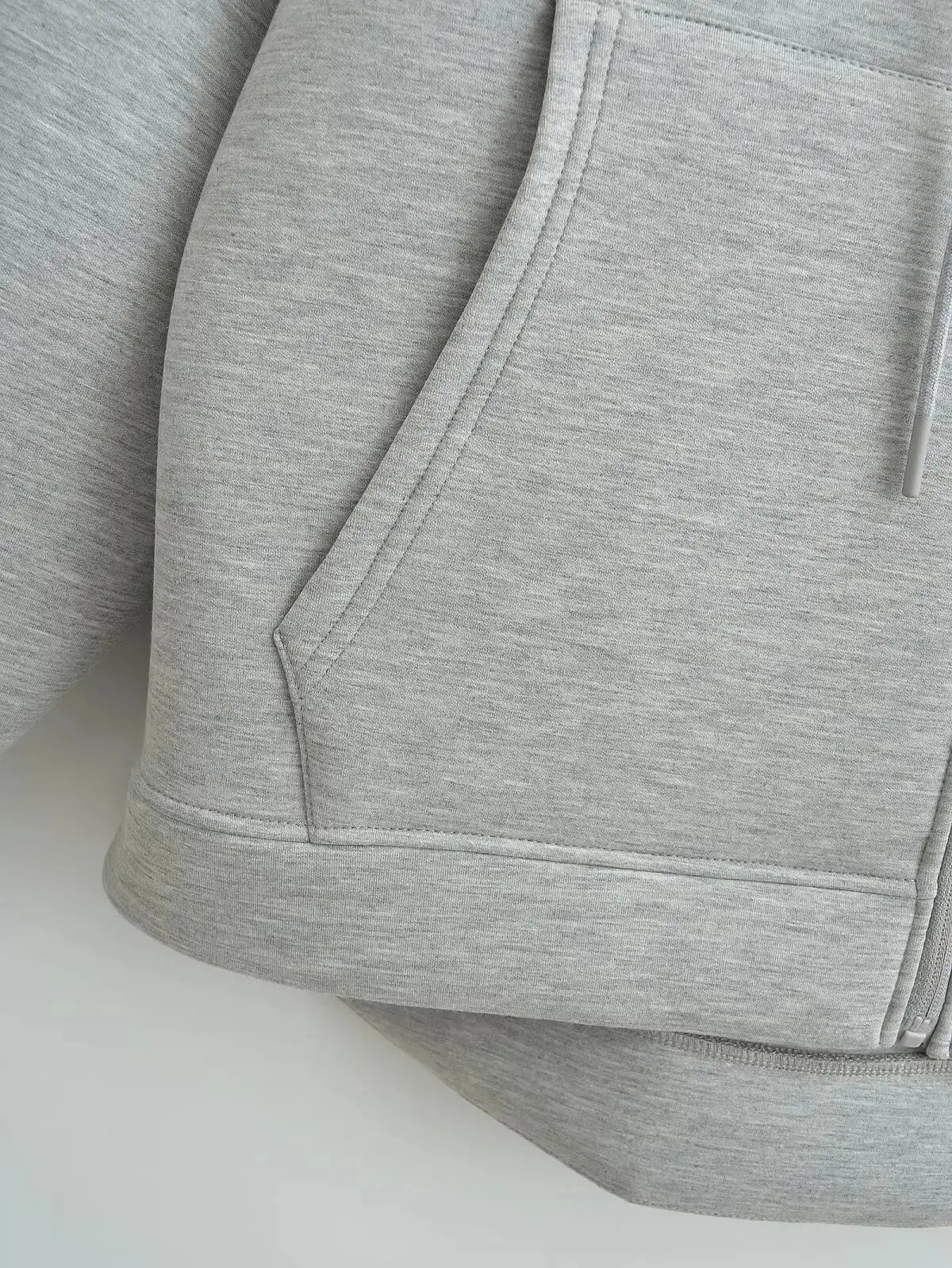 Veste oversize femme zippée à capuche gris style streetwear automne-hiver