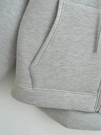 Veste oversize femme zippée à capuche gris style streetwear automne-hiver